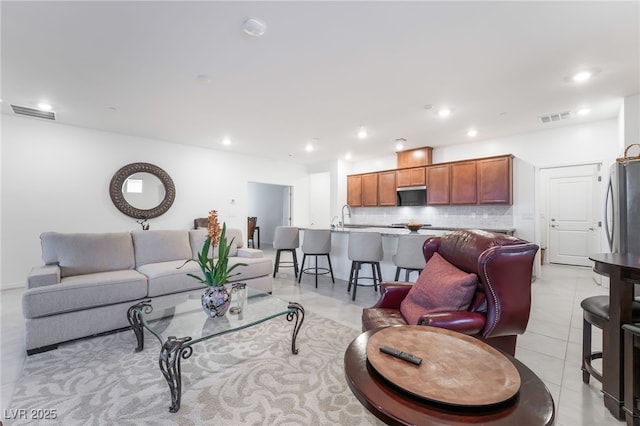 10216 Chrysolite Pl, Las Vegas, NV 89143 - living room featuring recessed lighting and light tile patterned floors
