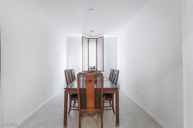 10216 Chrysolite Pl, Las Vegas, NV 89143 - dining space with light tile patterned floors and baseboards