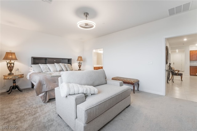 10216 Chrysolite Pl, Las Vegas, NV 89143 - bedroom featuring light colored carpet, baseboards, and ensuite bath