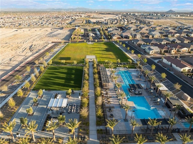 10216 Chrysolite Pl, Las Vegas, NV 89143 - aerial view of residential area featuring a pool and mountains