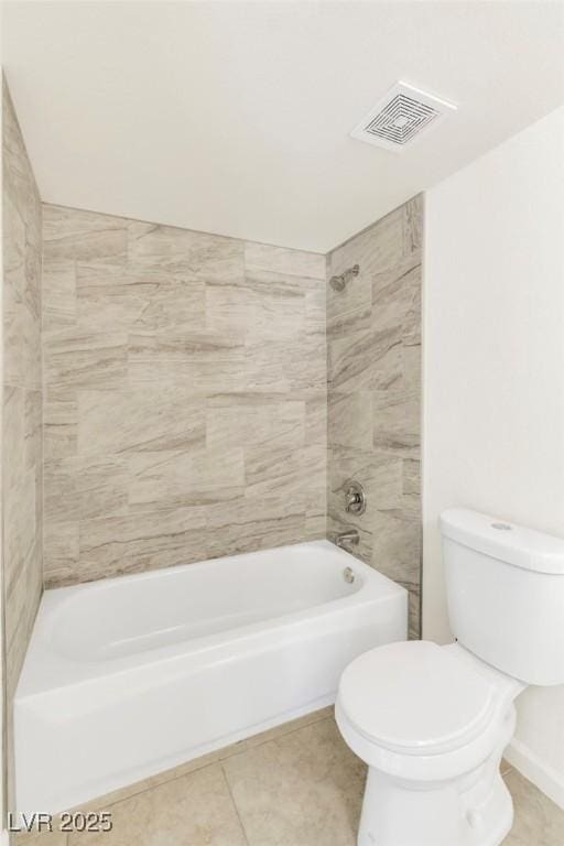 full bathroom featuring visible vents, toilet, tile patterned floors, and bathing tub / shower combination