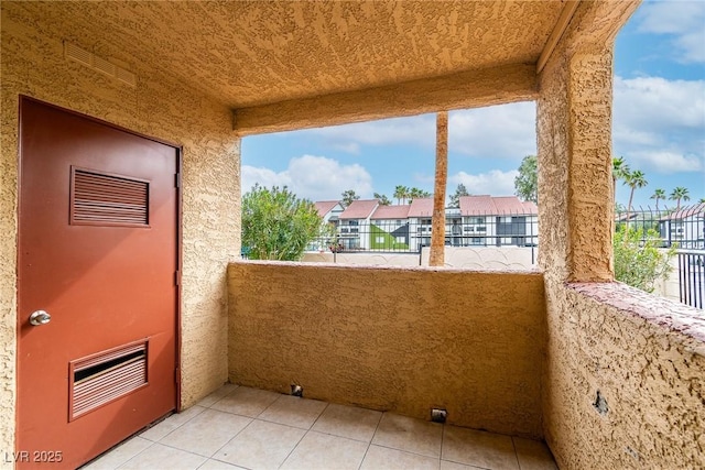 balcony featuring a residential view and visible vents