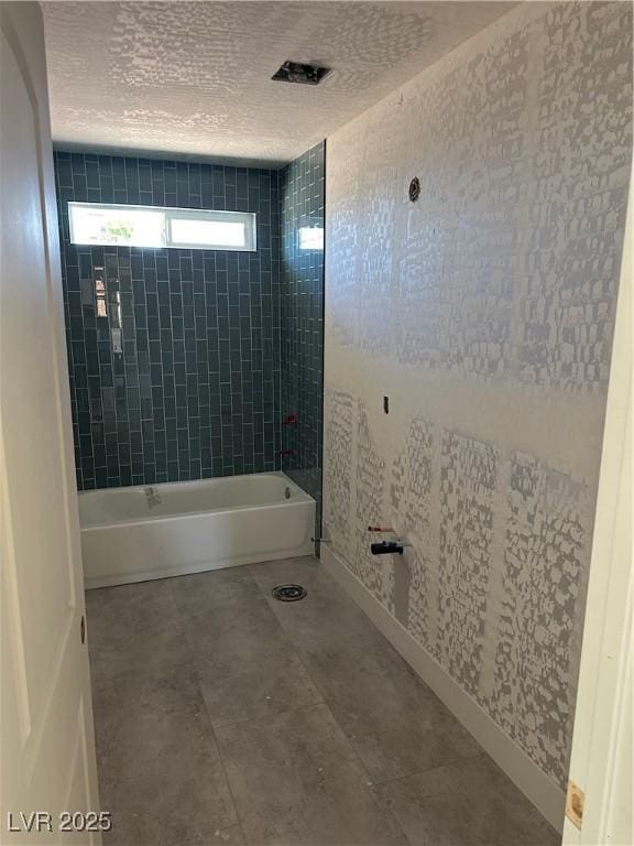331 Huracan St, Pahrump, NV 89048 - full bath featuring baseboards, shower / tub combination, tile patterned floors, and a textured ceiling