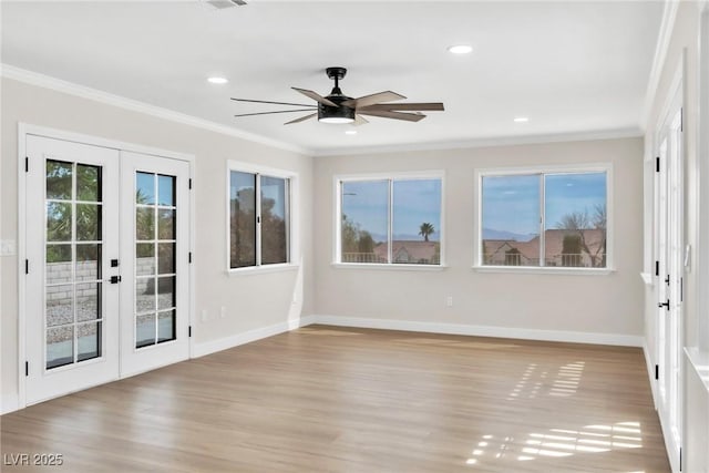 unfurnished sunroom with a wealth of natural light and french doors