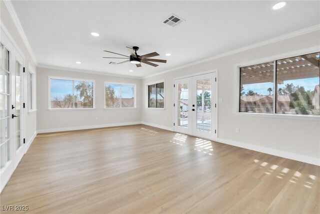 unfurnished living room featuring french doors, a ceiling fan, light wood-type flooring, baseboards, and visible vents