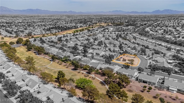 birds eye view of property featuring a residential view and a mountain view