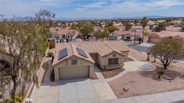 birds eye view of property featuring a residential view and a mountain view