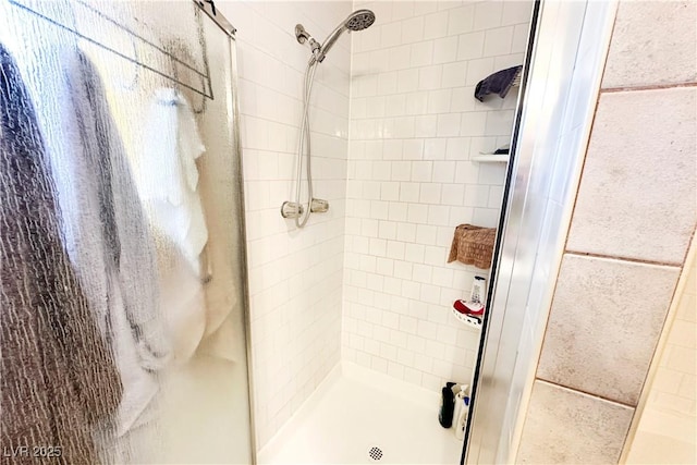bathroom with a stall shower
