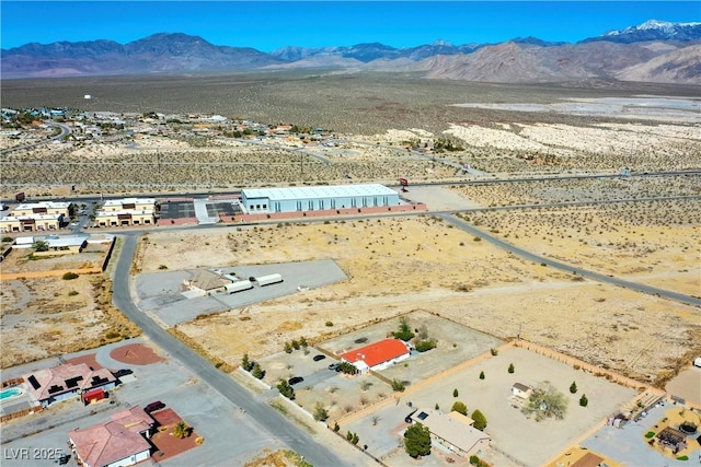 aerial view with a mountain view and a desert view