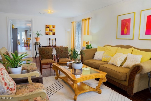 living area with wood finished floors
