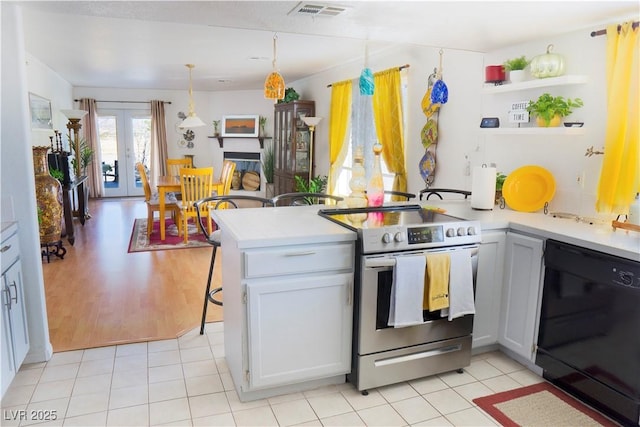kitchen with open shelves, black dishwasher, light countertops, a peninsula, and stainless steel electric range