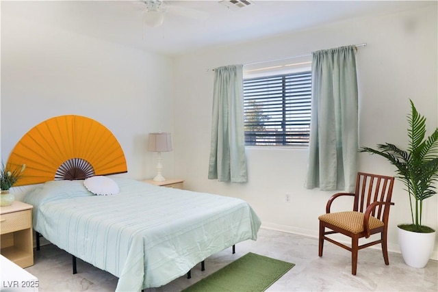 bedroom with visible vents and baseboards