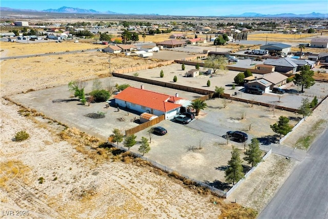 aerial view with a mountain view and view of desert