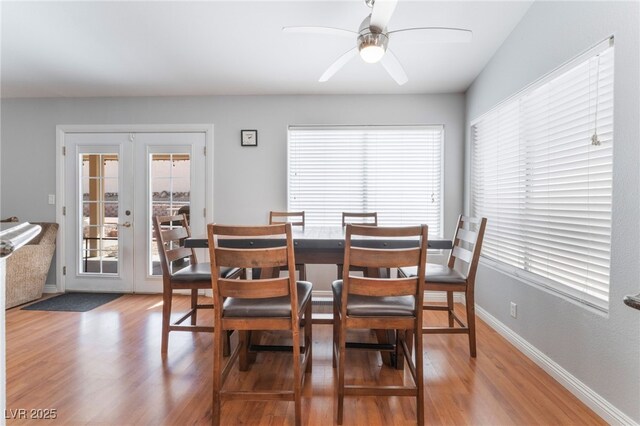 1010 Armillaria St, Henderson, NV 89011 - dining room with baseboards, ceiling fan, french doors, and light wood finished floors