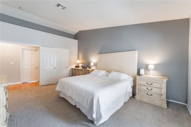 1010 Armillaria St, Henderson, NV 89011 - bedroom featuring light colored carpet, visible vents, baseboards, and vaulted ceiling
