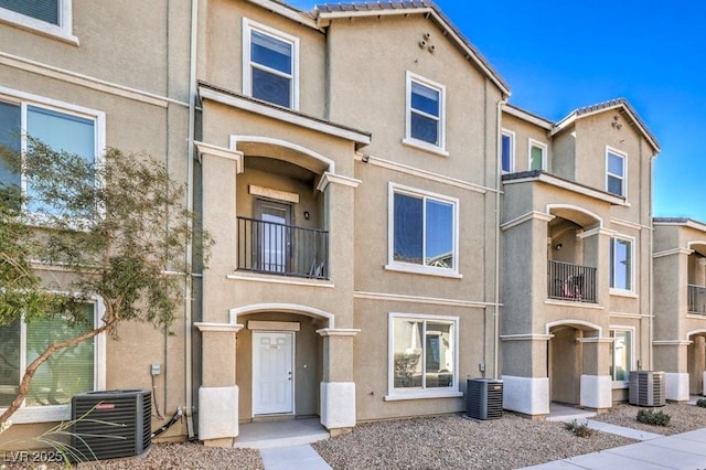 4516 Townwall St, Las Vegas, NV 89115 - townhome / multi-family property with central AC and stucco siding
