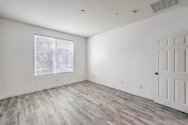 4516 Townwall St, Las Vegas, NV 89115 - empty room featuring light wood-type flooring, baseboards, and visible vents