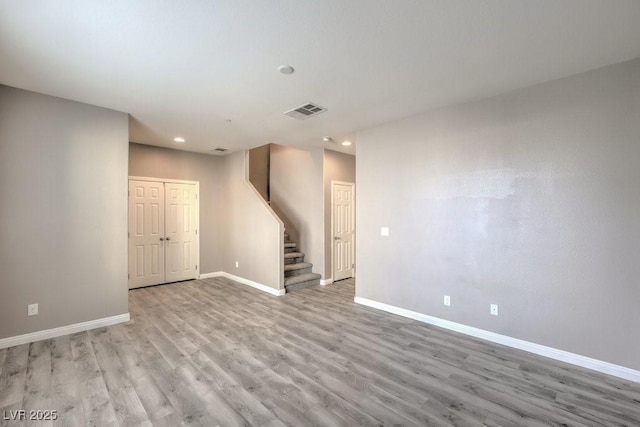 4516 Townwall St, Las Vegas, NV 89115 - interior space featuring stairs, light wood finished floors, baseboards, visible vents, and recessed lighting