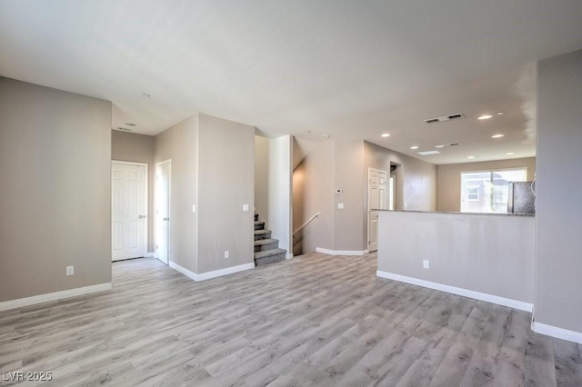 4516 Townwall St, Las Vegas, NV 89115 - empty room featuring light wood finished floors, baseboards, visible vents, and recessed lighting