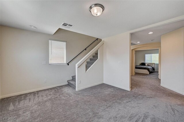 6516 Austin Hope Ave, Las Vegas, NV 89118 - unfurnished living room with carpet, stairway, baseboards, and recessed lighting