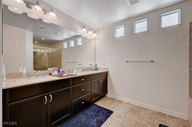 6516 Austin Hope Ave, Las Vegas, NV 89118 - bathroom with a stall shower, double vanity, and baseboards