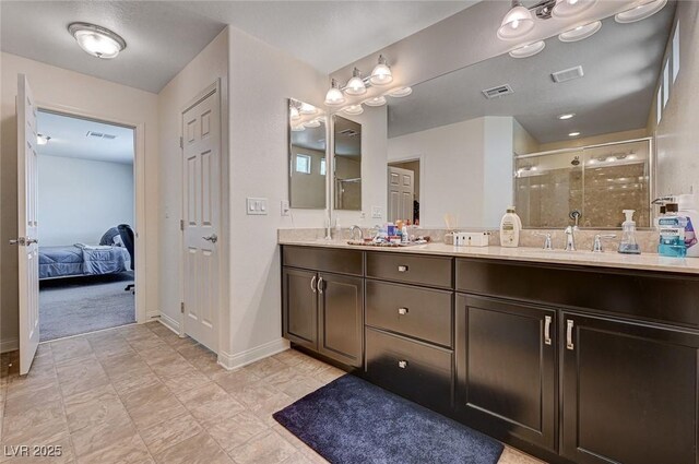 6516 Austin Hope Ave, Las Vegas, NV 89118 - bathroom with a shower stall, double vanity, and baseboards