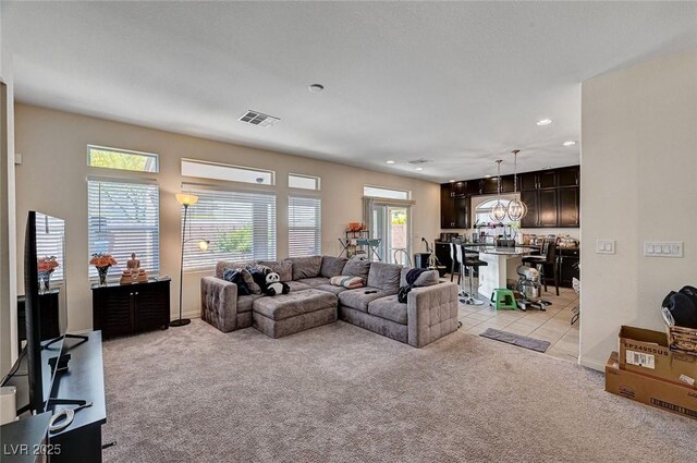 6516 Austin Hope Ave, Las Vegas, NV 89118 - living area featuring light carpet, recessed lighting, baseboards, and light tile patterned floors