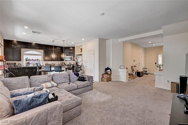 6516 Austin Hope Ave, Las Vegas, NV 89118 - living area featuring light colored carpet, baseboards, and recessed lighting