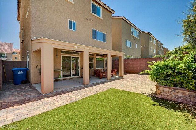 6516 Austin Hope Ave, Las Vegas, NV 89118 - back of house featuring stucco siding, a patio area, and a fenced backyard