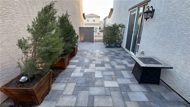 view of patio featuring fence