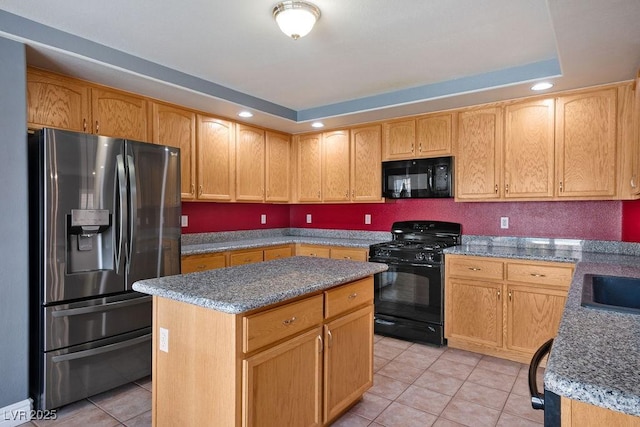 506 Staghorn Pass Ave, Las Vegas, NV 89183 - kitchen featuring black appliances, light tile patterned floors, stone counters, recessed lighting, and a center island