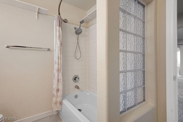 506 Staghorn Pass Ave, Las Vegas, NV 89183 - bathroom featuring shower / bath combo with shower curtain and baseboards