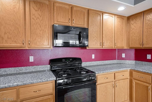 506 Staghorn Pass Ave, Las Vegas, NV 89183 - kitchen featuring black appliances, light stone countertops, and recessed lighting