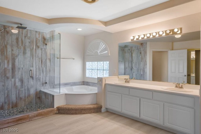 506 Staghorn Pass Ave, Las Vegas, NV 89183 - full bath with a shower stall, a garden tub, double vanity, and wood finished floors