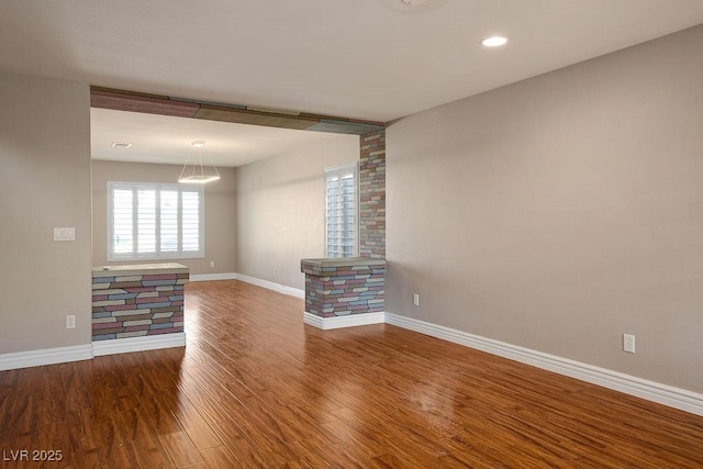 506 Staghorn Pass Ave, Las Vegas, NV 89183 - unfurnished room featuring wood finished floors, baseboards, and recessed lighting