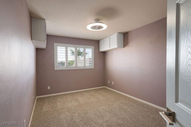 506 Staghorn Pass Ave, Las Vegas, NV 89183 - below grade area featuring carpet and baseboards