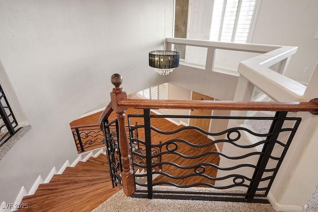 506 Staghorn Pass Ave, Las Vegas, NV 89183 - stairs with wood finished floors and baseboards