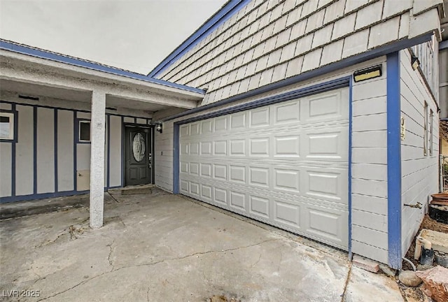 garage featuring driveway