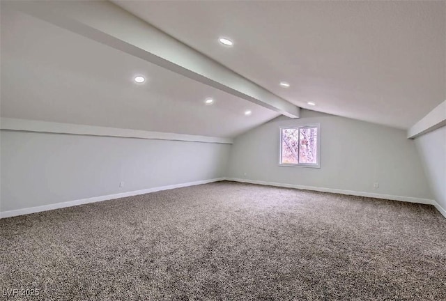 bonus room featuring carpet flooring, lofted ceiling with beams, baseboards, and recessed lighting