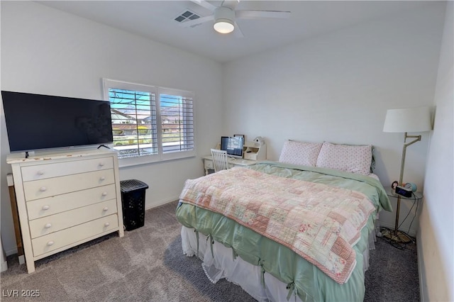 bedroom featuring baseboards, visible vents, carpet flooring, and a ceiling fan