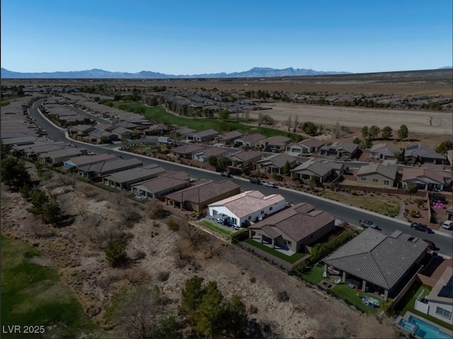 aerial view with a residential view and a mountain view