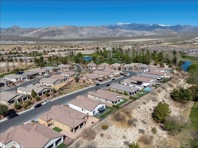 drone / aerial view with a mountain view and a residential view