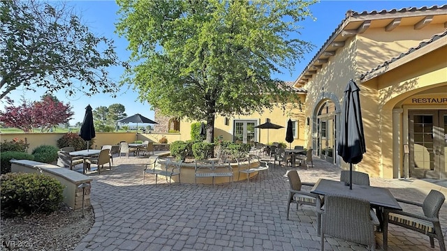 view of patio / terrace with outdoor dining space and french doors