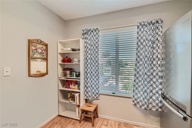 8628 Desert Holly Dr, Las Vegas, NV 89134 - interior space with baseboards and wood finished floors