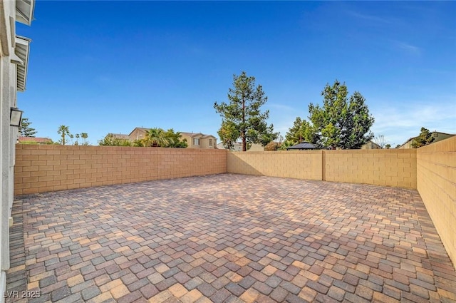 view of patio with a fenced backyard