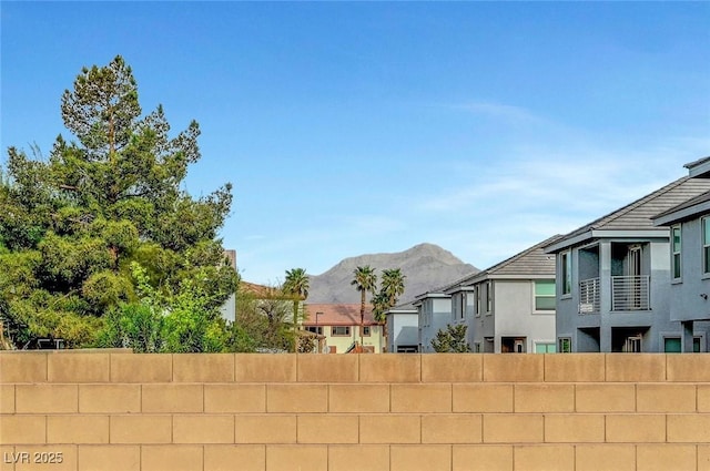 view of yard with a mountain view and a residential view