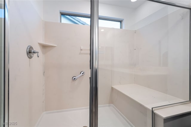 full bathroom with a shower stall