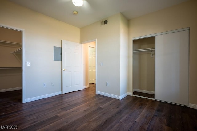 231 W Horizon Ridge Parkway Unit 314, Henderson, NV 89012 - unfurnished bedroom with a closet, dark wood-style flooring, electric panel, and baseboards