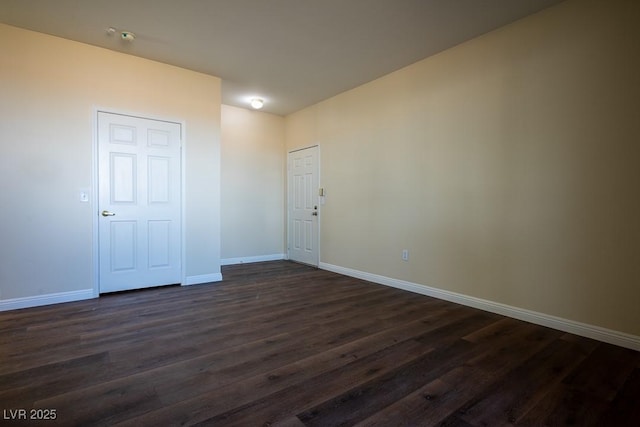 231 W Horizon Ridge Parkway Unit 314, Henderson, NV 89012 - spare room featuring baseboards, dark wood-style flooring, and a smoke detector