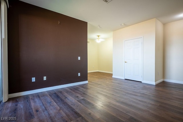 231 W Horizon Ridge Parkway Unit 314, Henderson, NV 89012 - spare room featuring dark wood-style floors and baseboards